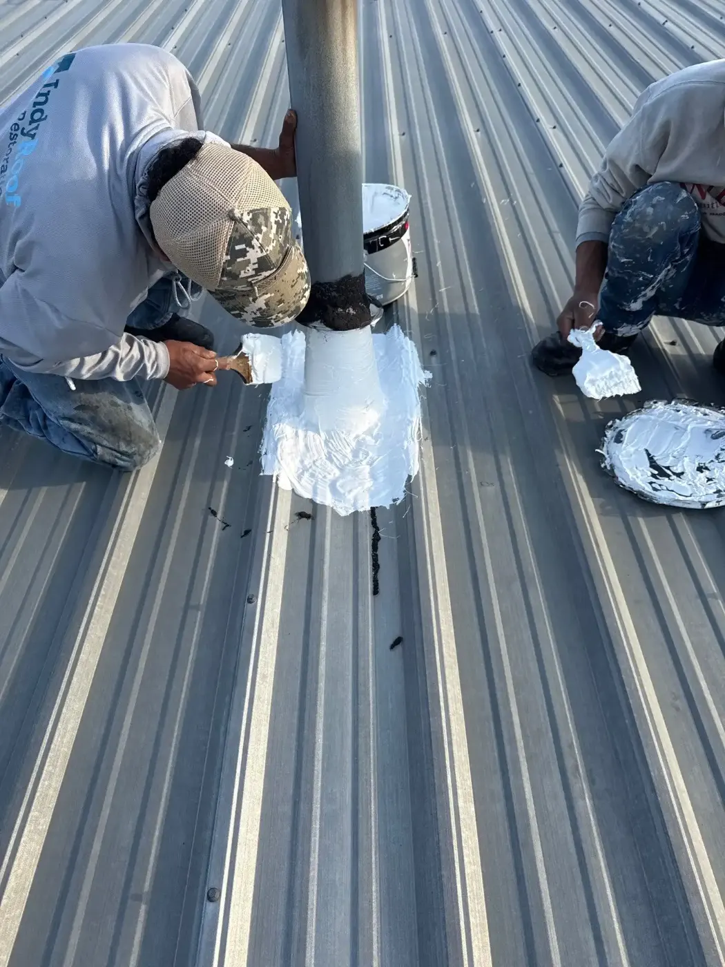 Tarping and dry-in on a Upland commercial roof